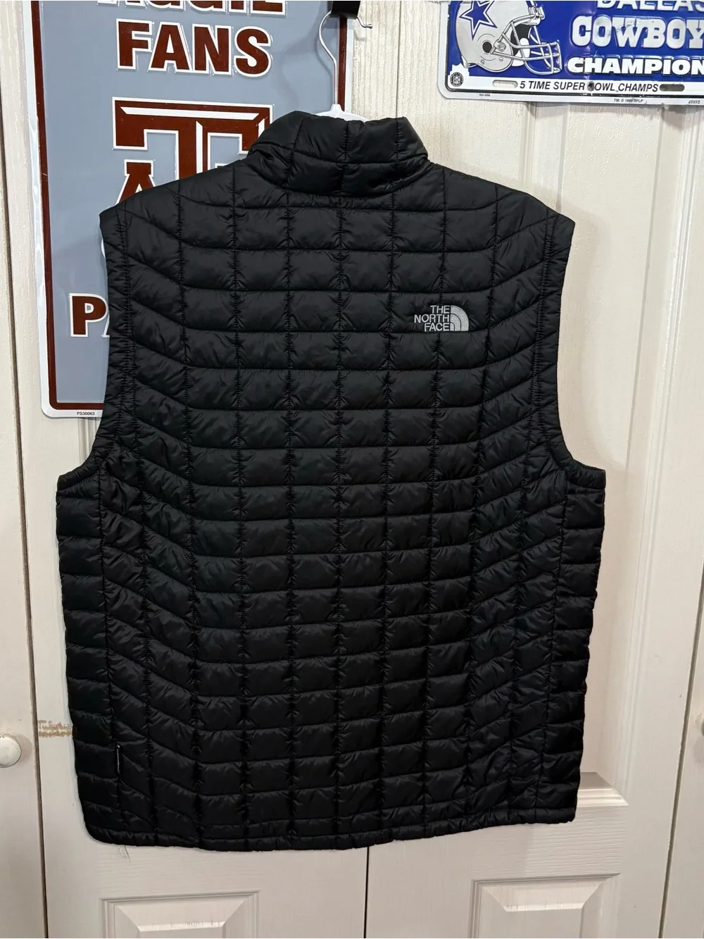 The North Face Black Quilted Puffer Vest with UT HSC Embroidery